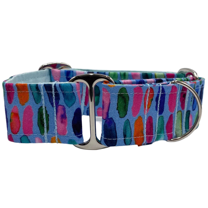 Colorful Watercolour Wonders Martingale Collar featuring a vivid watercolor paint splash design on blue fabric with sturdy silver hardware.